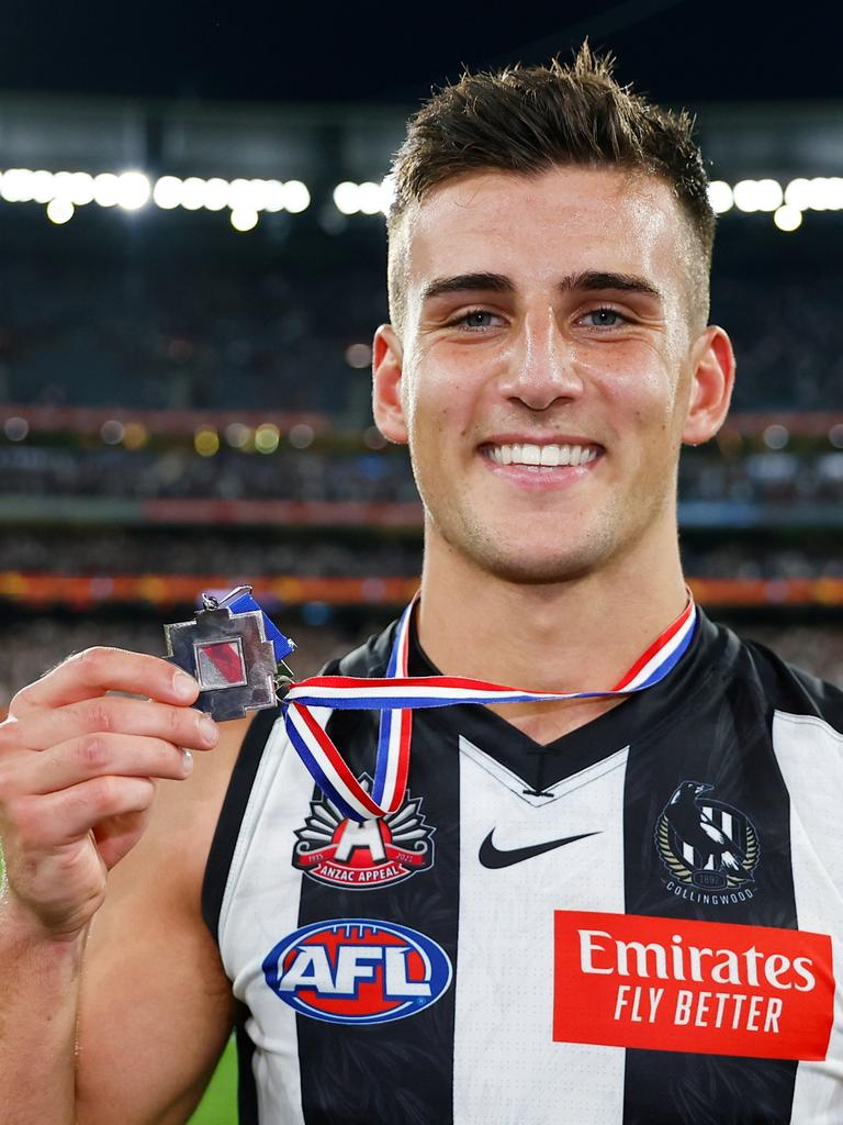 Nick Daicos shows off his Anzac Medal.