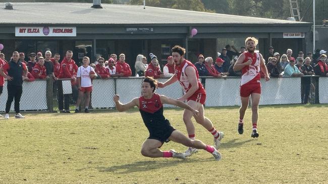 Tom Small kicks a great goal.