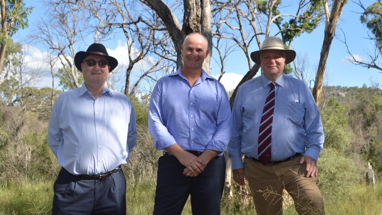 Granite Belt Irrigation Project chairman Dan Hunt, with State Water Minister Glenn Butcher and Southern Downs Mayor Vic Pennisi at the Emu Swamp Dam site. Photo: Tessa Flemming