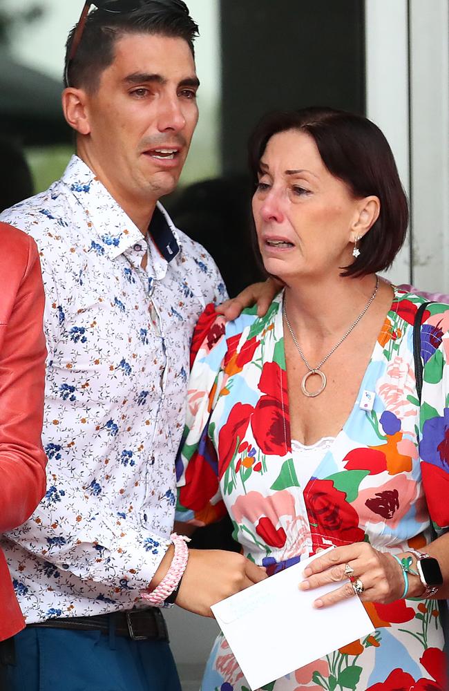 Nathaniel Clarke comforts his mother Suzanne during the funeral for Hannah Clarke and her three children Aaliyah, Laianah and Trey. (AAP Image/Jono Searle)