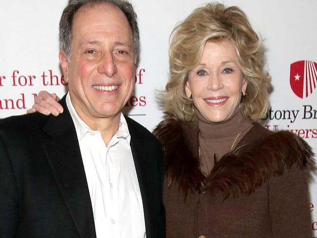 Michael Kimmel, pictured with Jane Fonda, says we need to ask what it means to be a man. Picture: Paul Zimmerman