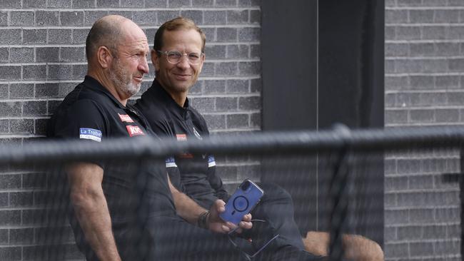 Charlie Gardiner (R) sitting with Collingwood CEO Craig Kelly. Picture: Michael Klein