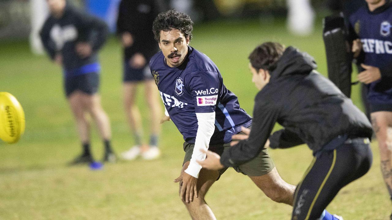 Former AFL player Tony Armstrong in action with his new teammates. Picture: Alan Barber.