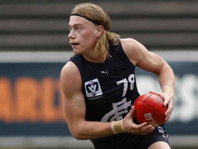 MELBOURNE, AUSTRALIA - MAY 06: Harley Reid of Carlton runs with the ball during the round seven VFL match between Carlton Blues and Brisbane Lions at Ikon Park on May 06, 2023 in Melbourne, Australia. (Photo by Darrian Traynor/AFL Photos/via Getty Images)