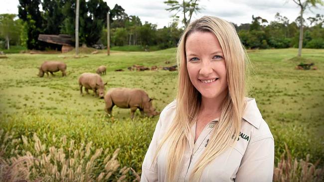 Australia Zoo welcomed Carrie, a baby rhino late last year and now the public can finally meet her on the zoo's African Savannah. Africa Keeper Kat Hansen. Picture: Patrick Woods