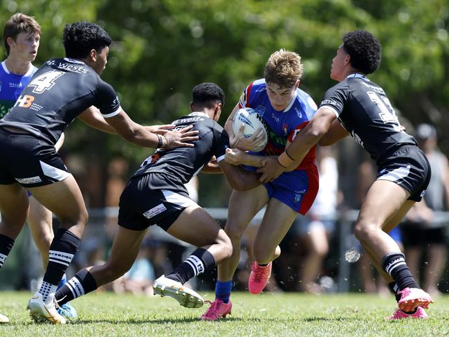 Callum Elsley is tackled. Picture: Michael Gorton