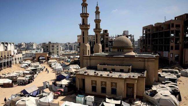 Tents housing displaced Palestinians set up next to a mosque in Gaza City. Picture; AFP.