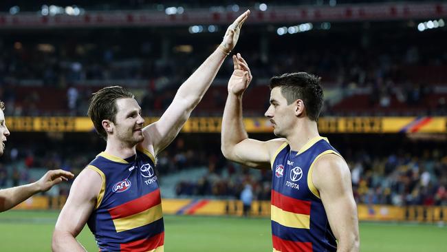 Former teammates Patrick Dangerfield and Taylor Walker have concerns about the proposal to place all 18 teams in three different states. Picture: Dylan Coker.