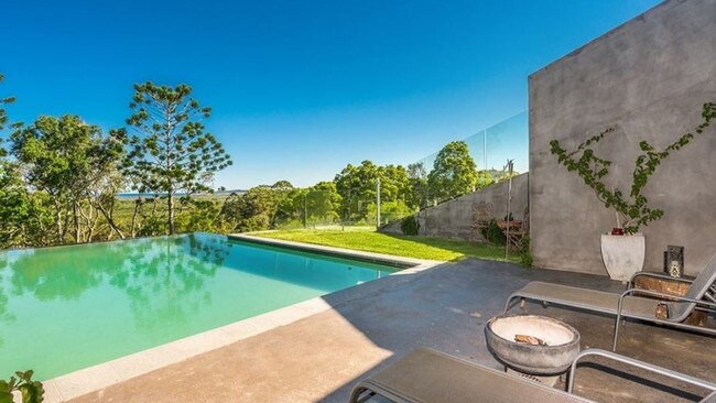 Imagine soaking up the sun by this pool … maybe inviting the famous neighbours over.