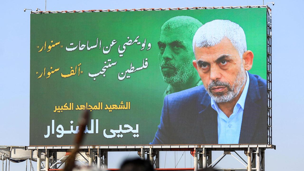 A billboard in Yemen depicting Hamas' slain leader Yahya Sinwar with the Arabic slogan ‘if Sinwar departs from the battlefields, Palestine will birth a thousand Sinwars’. Picture: Mohammed Huwais/AFP