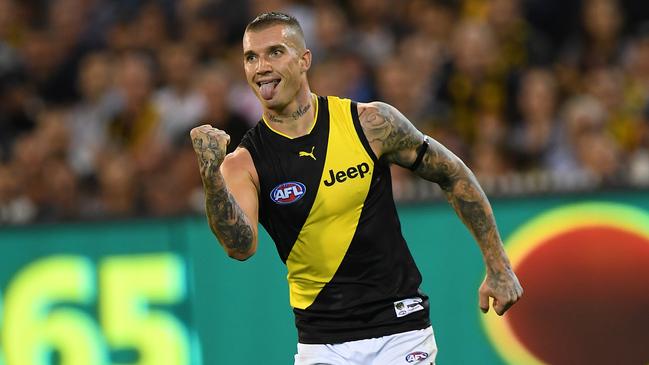 Dustin Martin of the Tigers reacts after kicking a goal during the Round 1 AFL match between the Carlton Blues and the Richmond Tigers at the MCG in Melbourne, Thursday, March 23, 2017. (AAP Image/Julian Smith) NO ARCHIVING, EDITORIAL USE ONLY