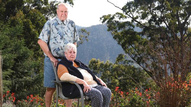 Stewart and Pamela Skeen at their rebuilt Binna Burra home, five years after it was destroyed by fire. The pair still get anxious during fire season. Picture Glenn Hampson