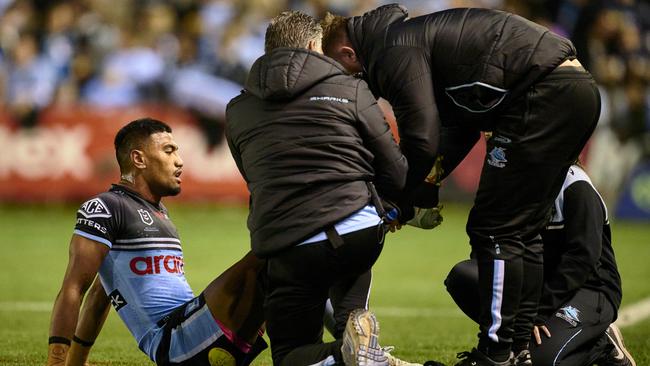 Mulitalo could barely move for 10 minutes but wanted to stay out there to support Wade Graham just days after the Sharks veteran announced this would be his final year in the NRL. Picture; Brett Hemmings/Getty Images