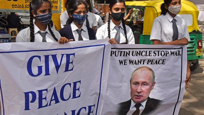 Students stage a demonstration urging Russia's President Vladimir Putin to halt the war on Ukraine. Photo: Manjunath Kiran/AFP