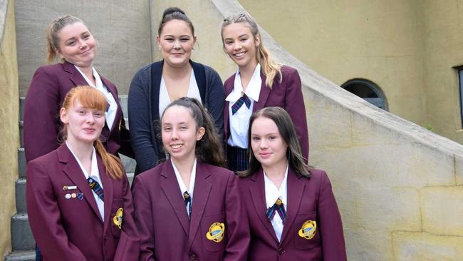 WELL DONE: Bursary winner Kaitlin Moat with Nanango State High School students: Gabby De Weers, Belinda Spencer, Samantha Taylor, Kate Perrett, and Amie Frohfloff. Picture: Madeline Grace