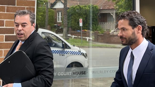 Air France pilot Victor Sanchez with his lawyer outside Waverley Local Court on Tuesday.