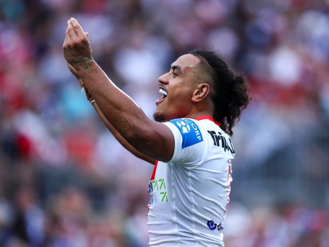 Dragons winger Christian Tuipulotu’s “show me the money” gesture. Photo: NRL