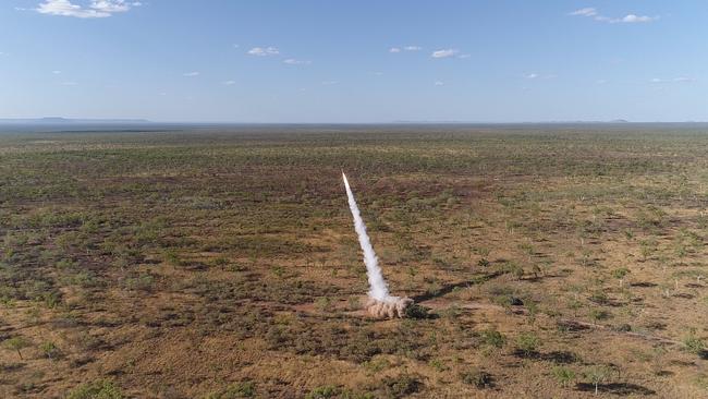 A United States Marine Corps M142 High Mobility Artillery Rocket System (HIMARS) fires a guided rocket against targets in the Northern Territory. Australia has plenty of uninhabited space in which to test future weapons.