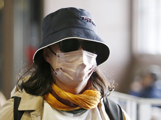 SYDNEY, AUSTRALIA - NewsWire Photos JULY 10 , 2024: Sydney siders masking up in public places as the Flu spreads.  respiratory syncytial virus (RSV) and the influenza. More than 118,000 Australians have reportedly been diagnosed with RSV this year Children aged up to four-years-old reported the highest rates of diagnosis this year, with the figure sitting at 62,475. RSV is a respiratory infection that typically affects young children, though adults can also catch it.Picture: NewsWire / John Appleyard