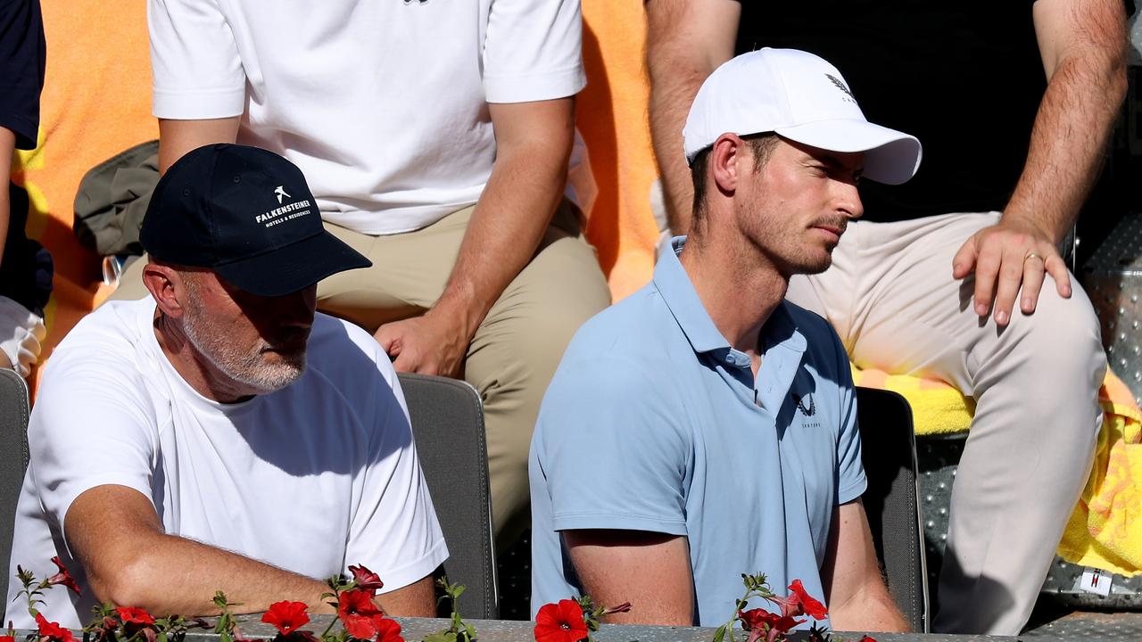 Murray (right) in the coach’s box in Madrid. (Photo by Clive Brunskill/Getty Images)