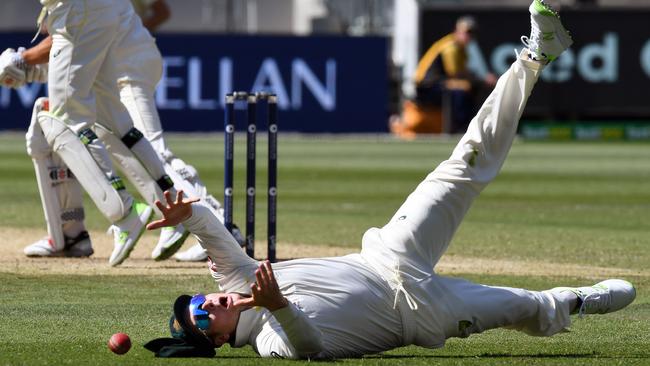 Australia captain Steve Smith drops a catch from England batsman Alastair Cook at the MCG yesterday