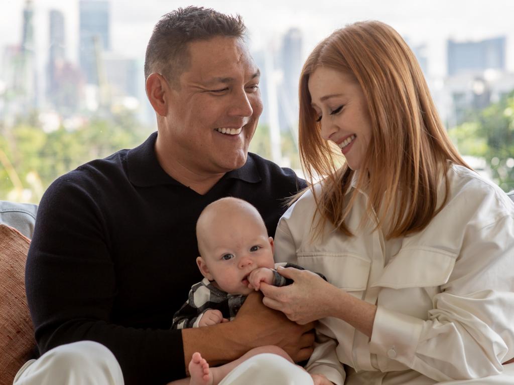 Former Olympic swimmer Geoff Huegill and his partner Roxan Toll and their baby boy Rafe pictured together in Singapore where they live. Photographer: Erik Magelssen