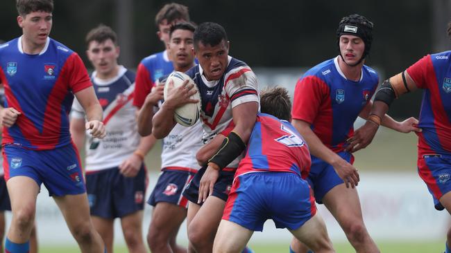 Josiah Fesolai in action for the Central Coast Roosters. Picture: Sue Graham