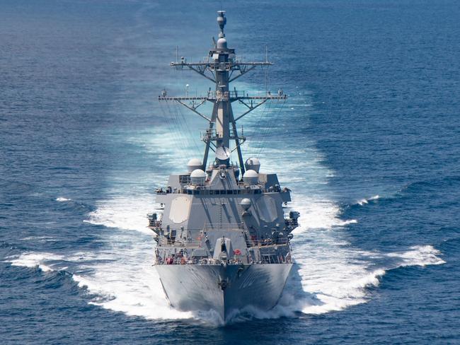 (FILES) In this file handout image courtesy of the US Navy taken on August 27, 2021 the AI Arleigh-burke class guided-missile destroyer USS Kidd (DDG 100) transits the Taiwan Strait during a routine transit. - The United States on September 2, 2022 announced a new $1.1 billion package of arms to Taiwan, vowing to keep boosting the island's defenses as tensions soar with Beijing. The sale comes a month after House Speaker Nancy Pelosi defiantly visited the self-governing democracy, prompting mainland China to launch a show of force that could be a trial run for a future invasion. (Photo by US NAVY / AFP) / RESTRICTED TO EDITORIAL USE - MANDATORY CREDIT "AFP PHOTO / US Navy" - NO MARKETING NO ADVERTISING CAMPAIGNS - DISTRIBUTED AS A SERVICE TO CLIENTS