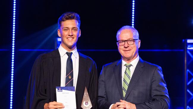 ACADEMIC SUCCESS: Mayor Mark Jamieson presenting Joshua Cox with the Sunshine Coast Christian College Dux award. Picture: Contributed