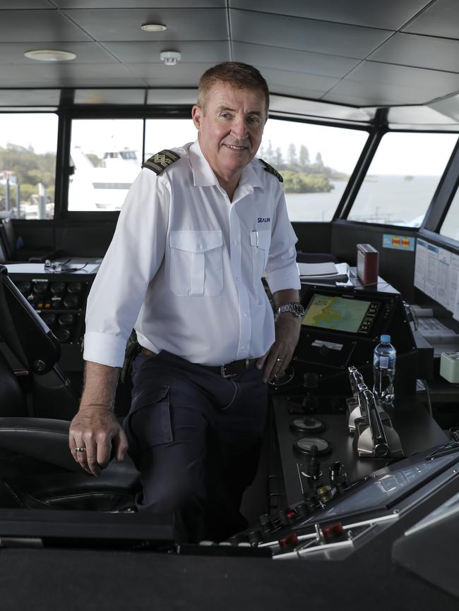 Sealink Stradbroke Island ferry master Leyland O'Brien at work. Photo: Mark Cranitch.