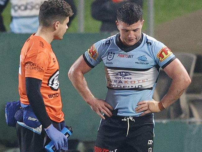 SYDNEY, AUSTRALIA - JULY 25: Chad Townsend of the Sharks walks off with an injury during the round 11 NRL match between the  Cronulla Sharks and the St George Illawarra Dragons at Netstrata Jubilee Stadium on July 25, 2020 in Sydney, Australia. (Photo by Mark Evans/Getty Images)