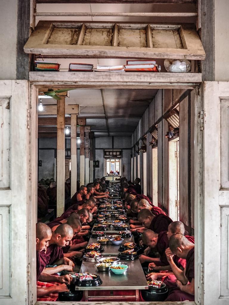 ‘Sacred Monk’ ... I was visiting Mahagandayon Monastery at Amarapura (Myanmar) to observe the monastic life. At noon, monks, nuns and novices lined up outside for their main and last meal of the day. Then, they went together to sit in the dining hall and eat. That’s when I stood in front of the side window and took this photo. Picture: Matheus Hobold Sovernigo, Brazil, Entry, Open, Culture, 2018 Sony World Photography Awards