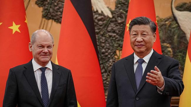 Chinese President Xi Jinping welcomes German Chancellor Olaf Scholz at the Grand Hall in Beijing on November 4 for a controversial meeting which saw the German leader come under sustained criticism.