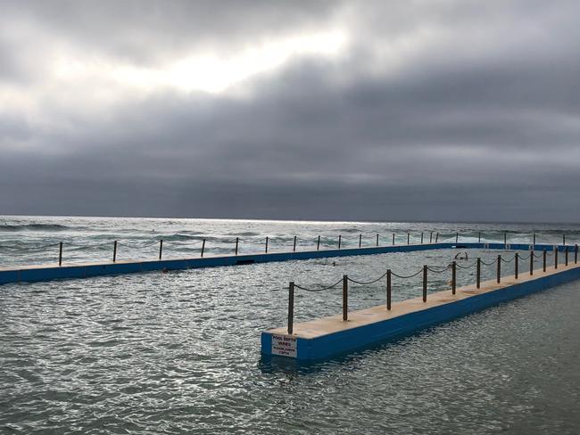 Swimming in a silver sea at the South Curl Curl ocean pool. #SnapSydney 2018. Picture: Jim O'Rourke