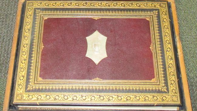 Police are trying to find the owner of a unique and possibly antique photo album. Picture: Victoria Police