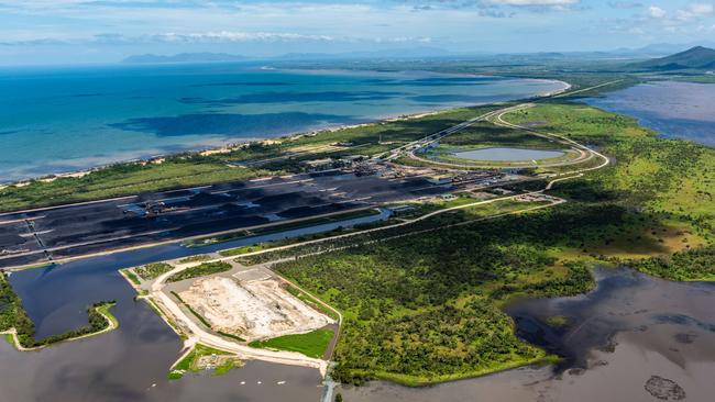 The Adani Abbot Point coal terminal and the Caley Valley Wetlands in February. The Queensland government has fined Adani $13,055 for releasing polluted stormwater into central Queensland wetlands during the recent major rain event. Picture: AAP Image/Supplied by the Australian Conservation Foundation