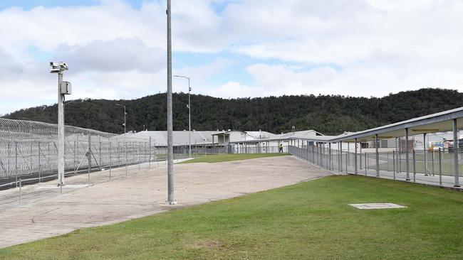 On the left, one of two of the razor-wire fences that surround the centre. Picture: Patrick Woods.