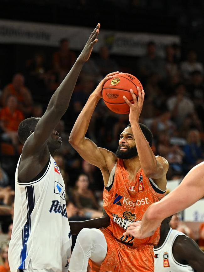CAIRNS, AUSTRALIA - SEPTEMBER 28: Pedro Bradshaw of the Taipans goes to the basket under pressure during the round two NBL match between Cairns Taipans and Adelaide 36ers at Cairns Convention Centre, on September 28, 2024, in Cairns, Australia. (Photo by Emily Barker/Getty Images)