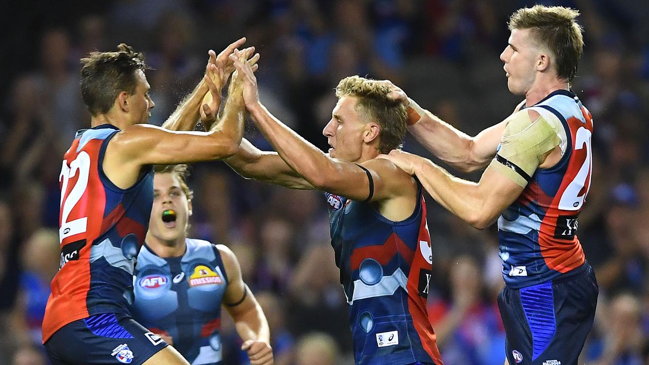 Aaron Naughton celebrates a goal with teammates. Picture: Getty Images 