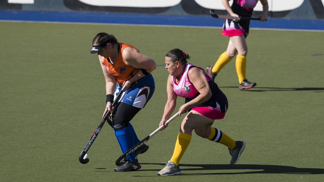 Jacky Hutton (left) of Maryborough 1 and Toowoomba 2 captain Allison Campbell.