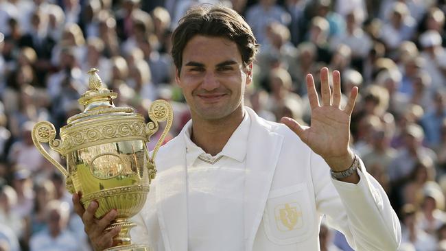 Roger Federer holds the trophy after Wimbledon 2007.