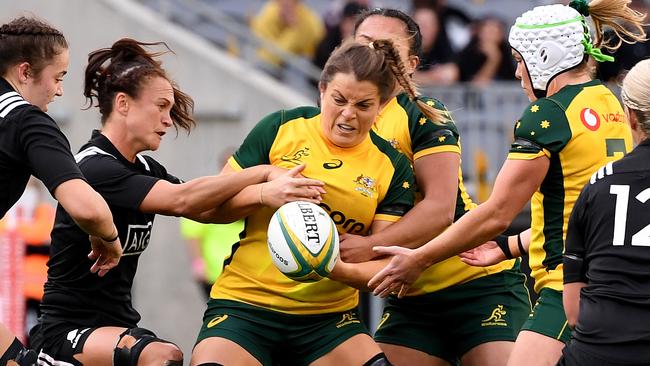 Grace Hamilton at the centre of the action against New Zealand.