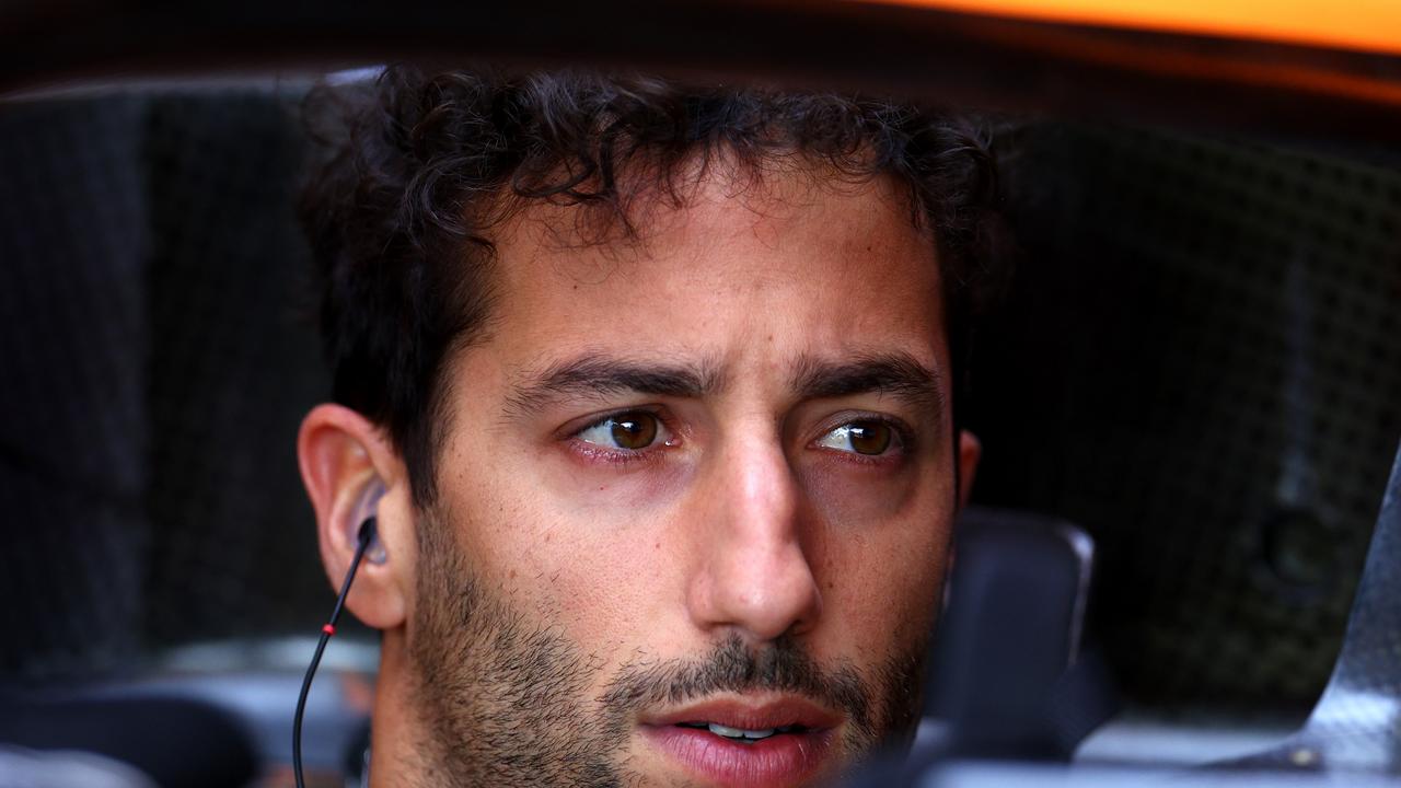 NORTHAMPTON, ENGLAND - JULY 01: Daniel Ricciardo of Australia and McLaren prepares to drive in the garage during practice ahead of the F1 Grand Prix of Great Britain at Silverstone on July 01, 2022 in Northampton, England. (Photo by Clive Rose/Getty Images)