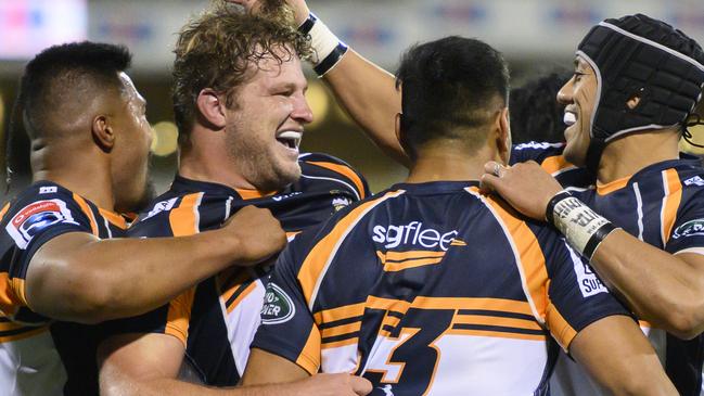 Brumbies players celebrate a James Slipper try. Picture: AAP