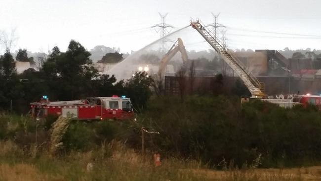 Firefighters work to put out the fire at the Knox Transfer Station in November 2019. Picture: EPA