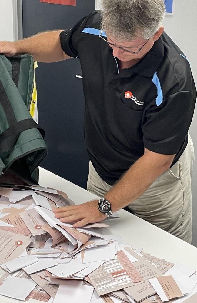 NT Electoral Commission staff will count postal and declaration votes in the Lyons Ward by-election over the next two weeks before preferences are counted on September 15. Picture: Annabel Bowles