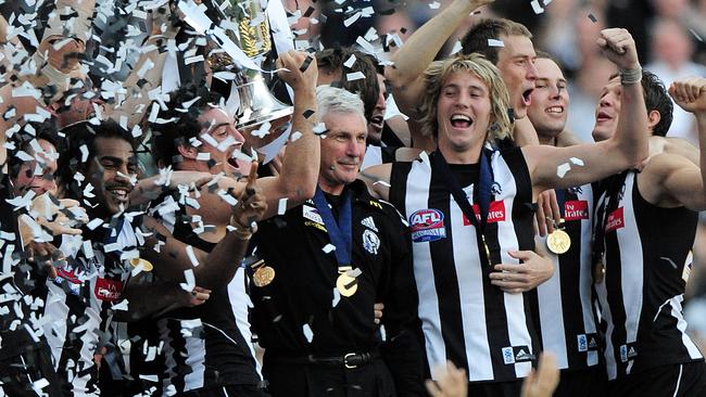 Mick Malthouse and the Pies celebrate in 2010.