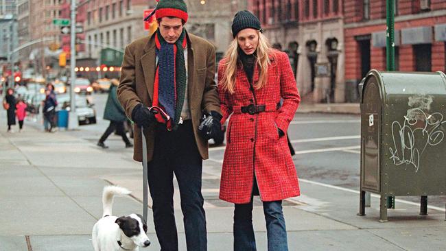 John F. Kennedy Jr. and Carolyn Bessette Kennedy walking their dog Friday in 1997. (Picture: Getty Images)