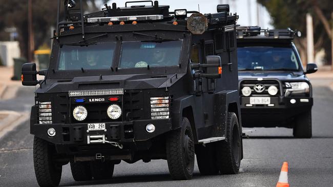 STAR Group officers drive a Bearcat vehicle near the exclusion zone at the scene of the shooting in 2015. Picture: Mark Brake