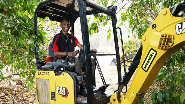 The Queensland Government has signed a historic land use agreement with the Djabugay Nations traditional owners to allow for the continuation of works on the Wangetti Trail hiking and cycling track, from Palm Cove to the Mowbray River. Yarrabah youngster Touche Gray has scored a plant operator traineeship with Wagners Australia to work on the Wangetti Trail currently under construction at Palm Cove. Picture: Brendan Radke